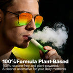Man with orange gradient sunglasses using a green HOLYMOLY Mint herbal diffuser with white aromatic vapor clouds
