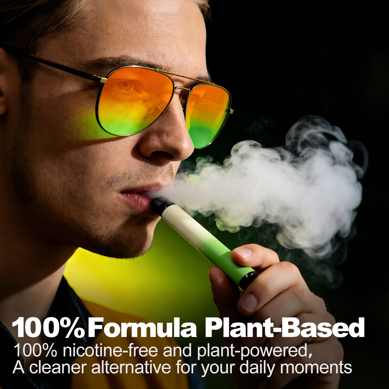 Man with orange gradient sunglasses using a green HOLYMOLY Mint herbal diffuser with white aromatic vapor clouds