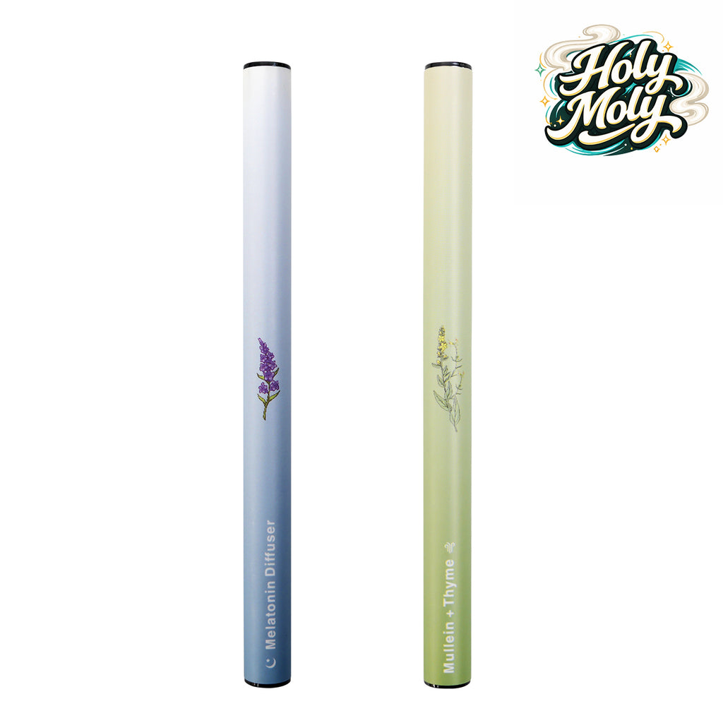 Two slim HOLYMOLY herbal diffusers on a white background: one green-gradient Mint flavor and one blue-gradient Lavender flavor.